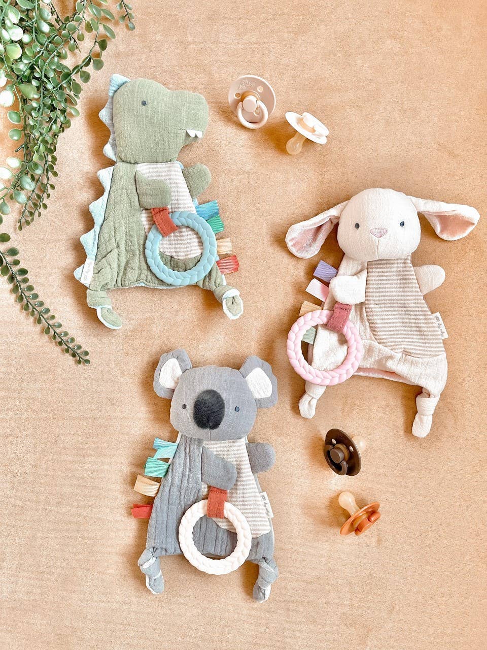 Bitzy Crinkle™ Sensory Toy With Teether: Dino